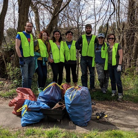 JB Media team volunteering with Asheville Greenworks